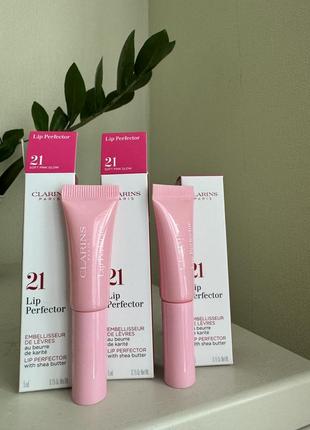 Увлажняющий блеск для губ clarins natural lip perfector1 фото