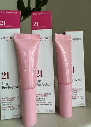 Увлажняющий блеск для губ clarins natural lip perfector10 фото