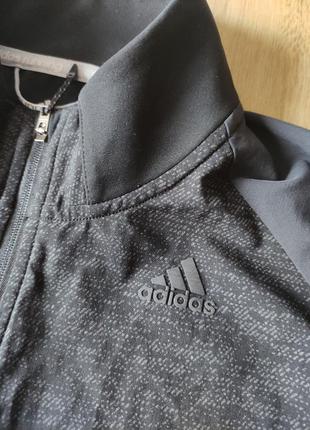 Крута жіноча вітровка adidas, оригінал, розмір м.9 фото