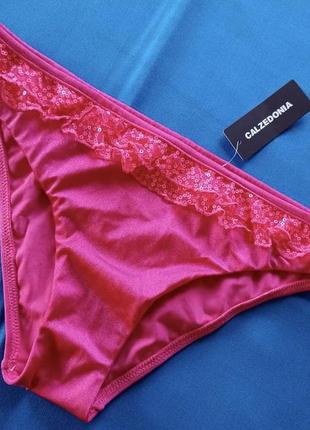 Розовые плавки с рюшами и пайетками от calzedonia