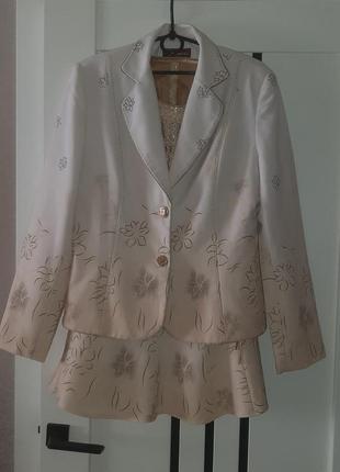 Костюм  летний женский фирменный с юбкой очень качественный