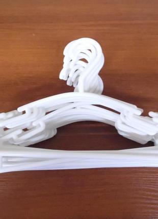 Тремпель для одягу