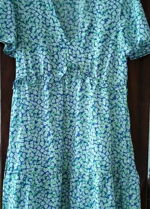 Гарненька,легенька сукня з ніжним принтом,не світить. ог по виробу 98.по бірочці м