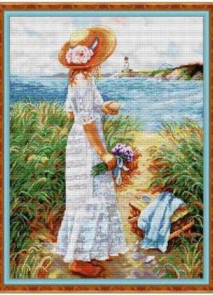 Набір для вишивання за нанесеною на канву схемою "girl holding flowers by the sea". aida 14ct printed 41*52 см
