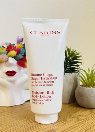 Оригінал зволожуючий бальзам clarins moisture-rich body оригинал крем лосьон для тела