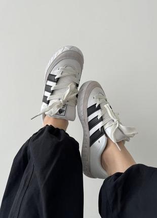 Кросівки adidas astir3 фото