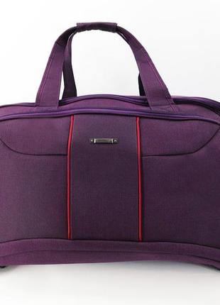 Маленька дорожня сумка на 3 колесах flippini невелика тканинна жіноча дорожня сумка на колесах