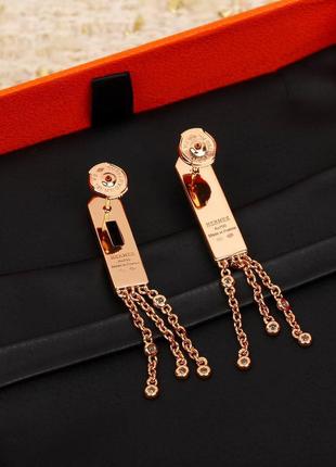 Серьги золотистые с камушками