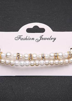 Браслет "жемчуг" ( акрил ) з золотистыми ронделями