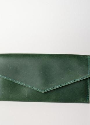 Вместительное портмоне  из натуральной винтажной кожи зеленого цвета1 фото