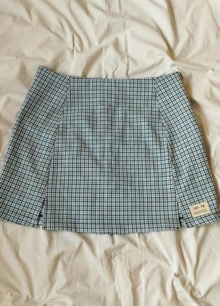 Блакитна міні спідниця в клітинку