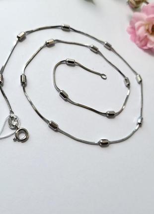 Серебряная цепочка цепь круглая снейк с боченками 45 см серебро 925 пробы родированное 3.60г 254р2/45