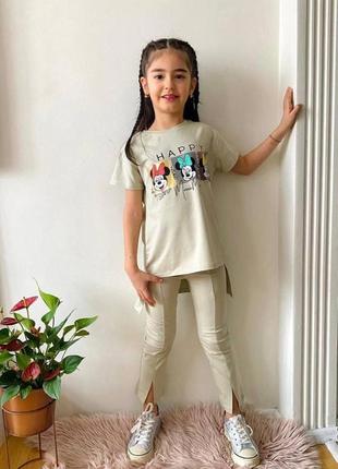 Стильні костюм для дівчинки подовжена футболка та штани з розрізами спереду