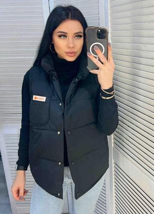 Женская жилетка