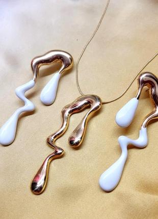 Комплект бижутерии колье та сережки