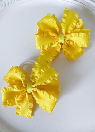 Набір бантиків на резинці.бантики жовті