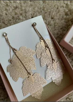 Золотистые брендовые серьги h&m