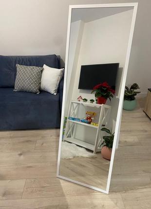 Дзеркало підлогове в тонкій рамі білого кольору на ніжці 150 х 50 см