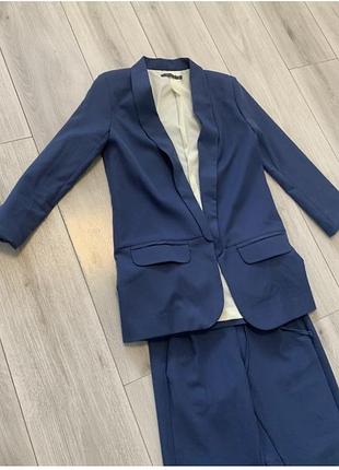 Жіночий класичний костюм синій xs