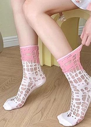 Трендові рожеві шкарпетки в дірки1 фото
