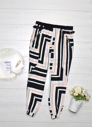 Штани в красивий принт river island.