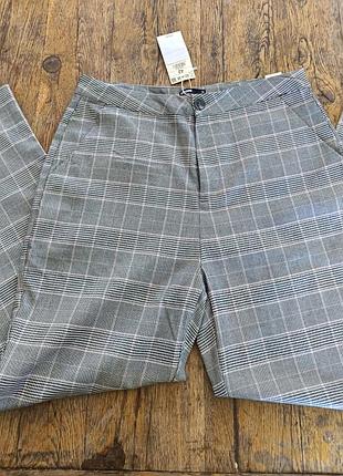 Брюки чиносы