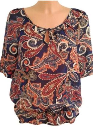 Кольорова блуза у квітковий принт