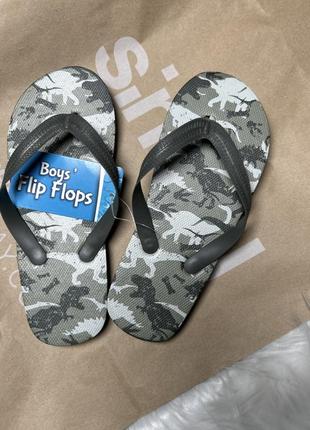 Шльопанці динозаври