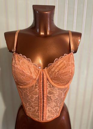Корсет оранжевого цвета