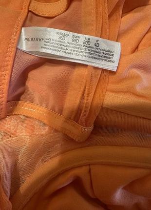 Корсет оранжевого цвета