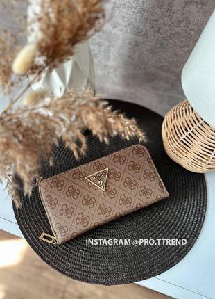 Жіночий бежевий гаманець guess