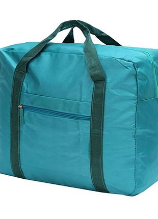 Сумка в дорогу для подорожей з кріпленням на валізу зелена