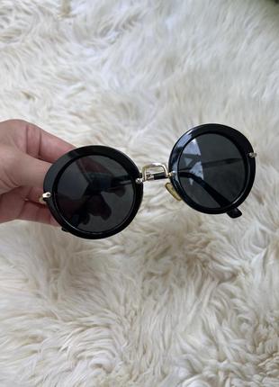 Сонцезахисні окуляри miu miu