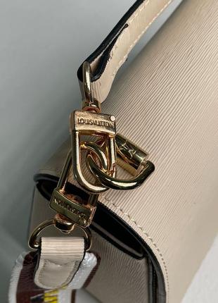 Сумка у стилі louis vuitton large twist mm epi leather beige5 фото