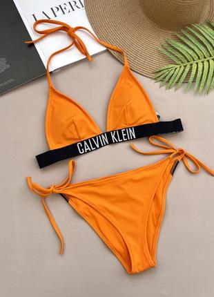 Раздельный купальник calvin klein оранжевого цвета