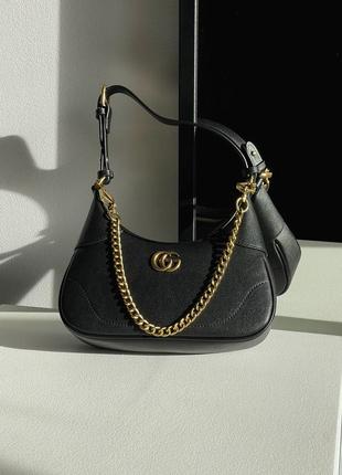 Кожаная сумка в стиле известного бренда2 фото