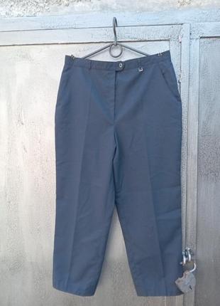 Темно сині жіночі штани 44 р.,наш 50-52