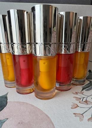 Clarins зволожуюче масло-блиск для губ