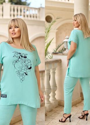 Костюм 
"силует з квітами " 
розміри: 48-50, 52-54, 56-58.