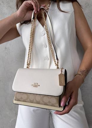 Белая кожаная сумка коач coach klare