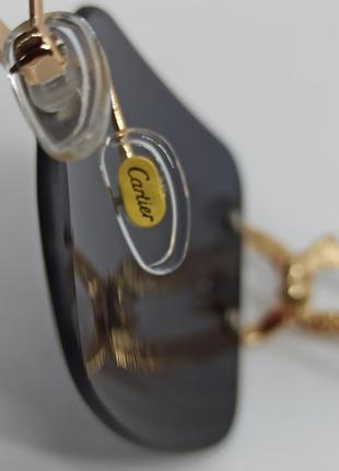 Окуляри в стилі cartier унісекс сонцезахисні безоправні чорні в золотому металі