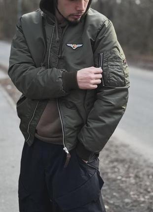 Бомбер olymp