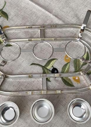 Марміт . посріблена підставка під гаряче.