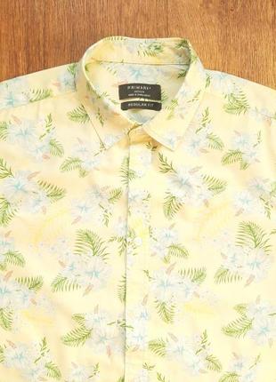 Теніска світло-жовта primark regular (англія) m c блакитними квітами.