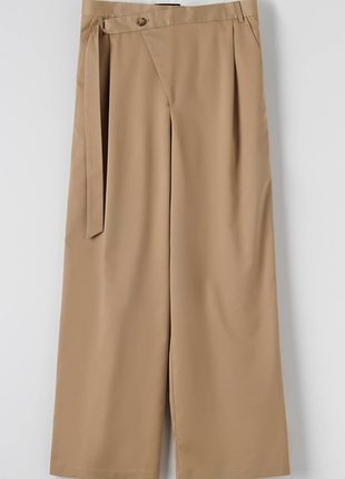 Стильные широкие бежевые брюки wide leg в размере l. sinsay