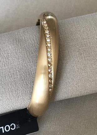 Браслет на пружине из матового золота под лаком бренд