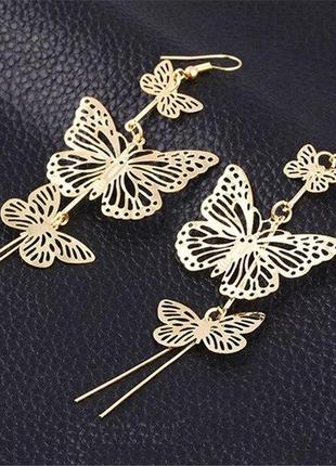 Золотистые висячие серьги