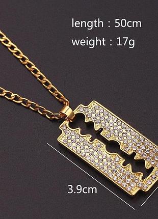 Золотиста підвіска з камінцями на ланцюжку