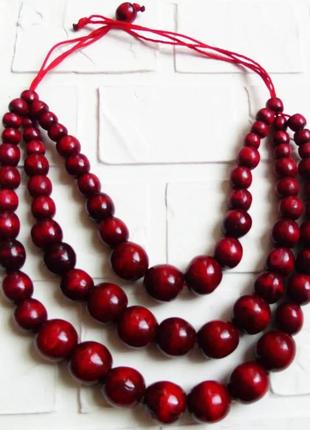 Буси дерев'яні потрійні на шнурку