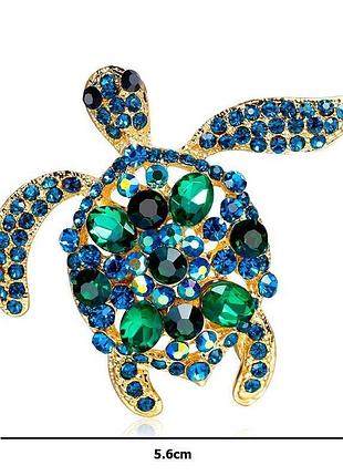 Брошка із зеленими стразами